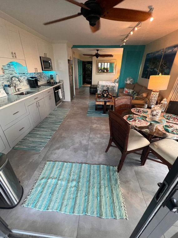 Galley kitchen with a full-size refrigerator and convection oven at this St. Thomas rental with an on-site restaurant